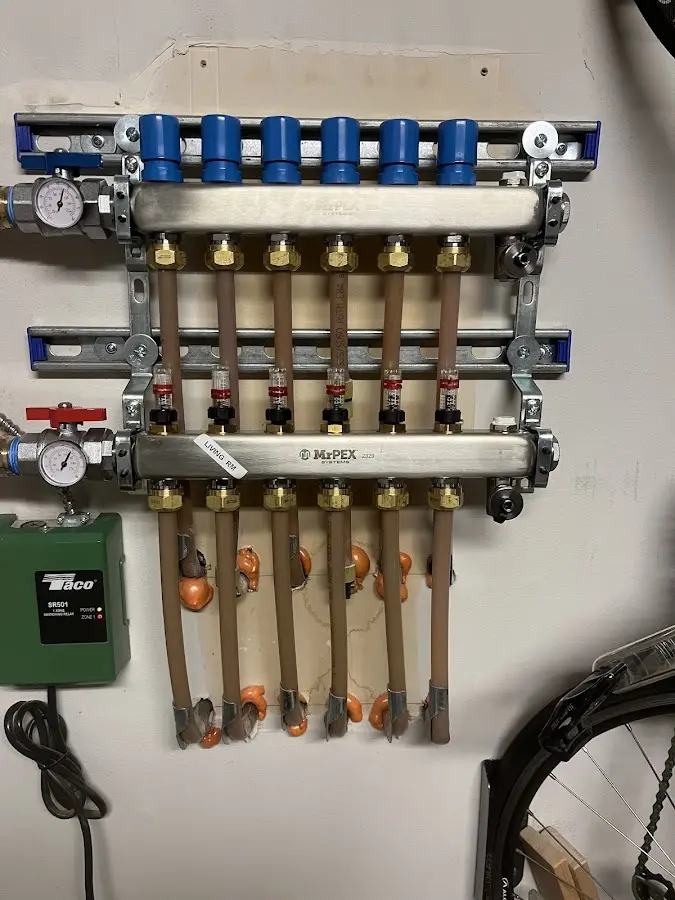 Plumber performing Gas Leak Detection at a residential property in Pelham Manor